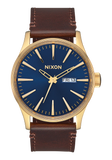 Nixon - Sentry Leather Polished Gold / Navy Sunray